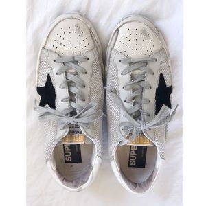 Golden goose superstar white and black sneakers